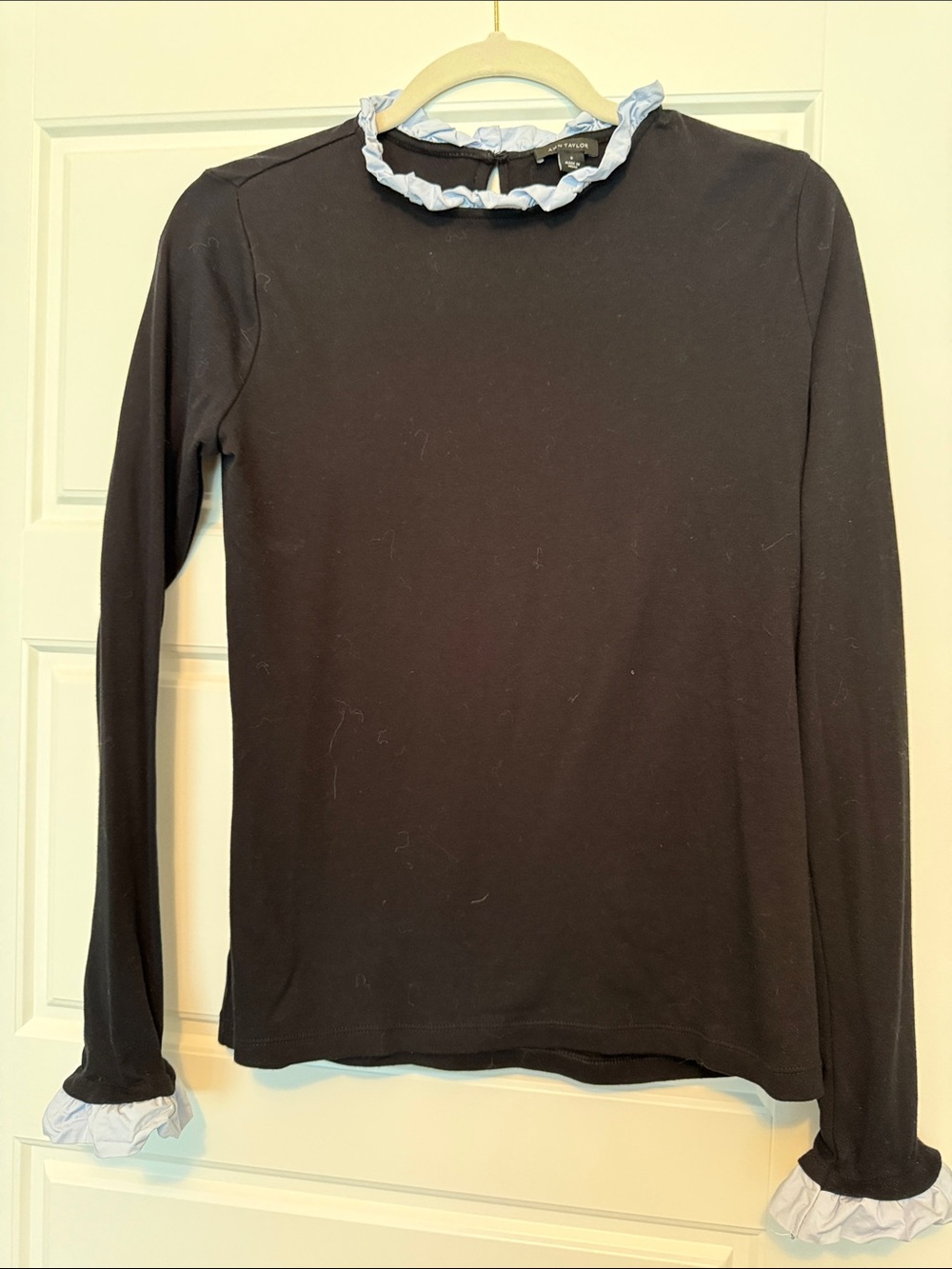 Ann Taylor Black Long Sleeve Top with Light Blue Ruffle Trim